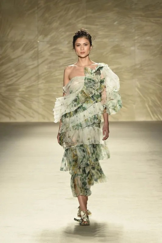 The fashion show featured custom-made shoes by Carlota .