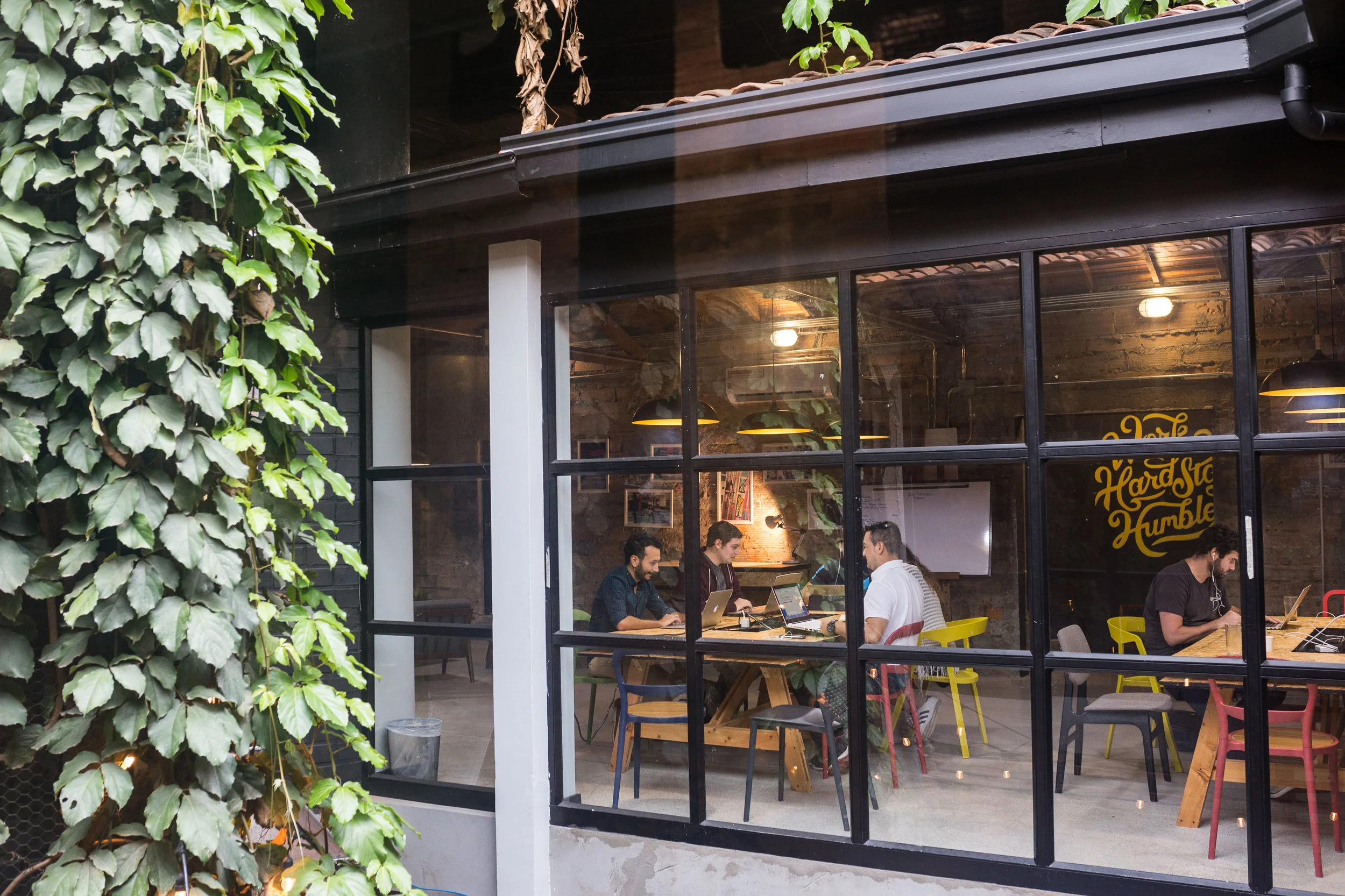 A view through the window of the co-working area.
