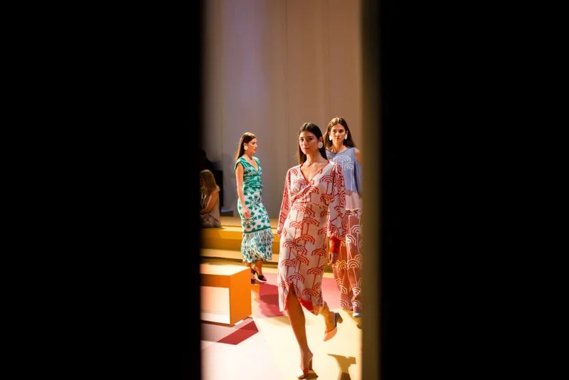 A backstage view of last year's inaugural runway show with Pepa Pombo .