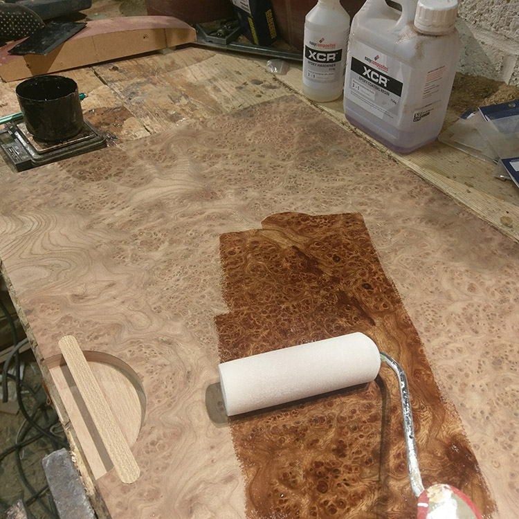 Applying an epoxy resin grain filler