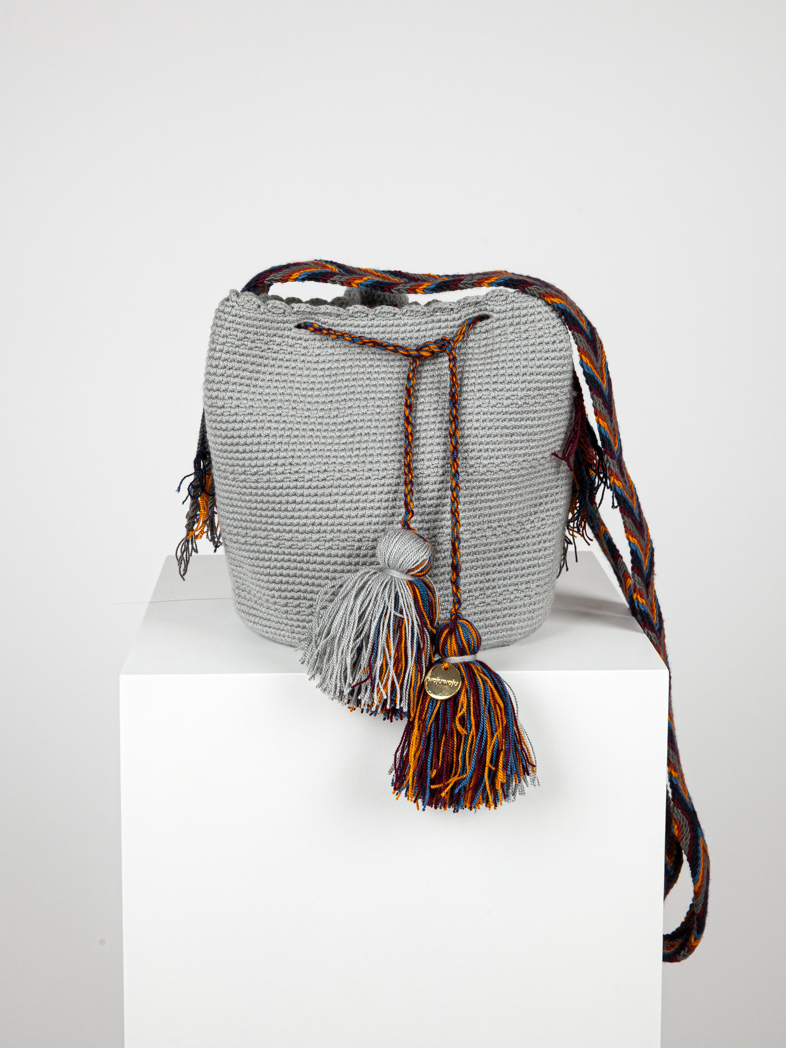 MEDIUM WAYUU UNI-COLOUR BAG- GREY / RED TASSLE