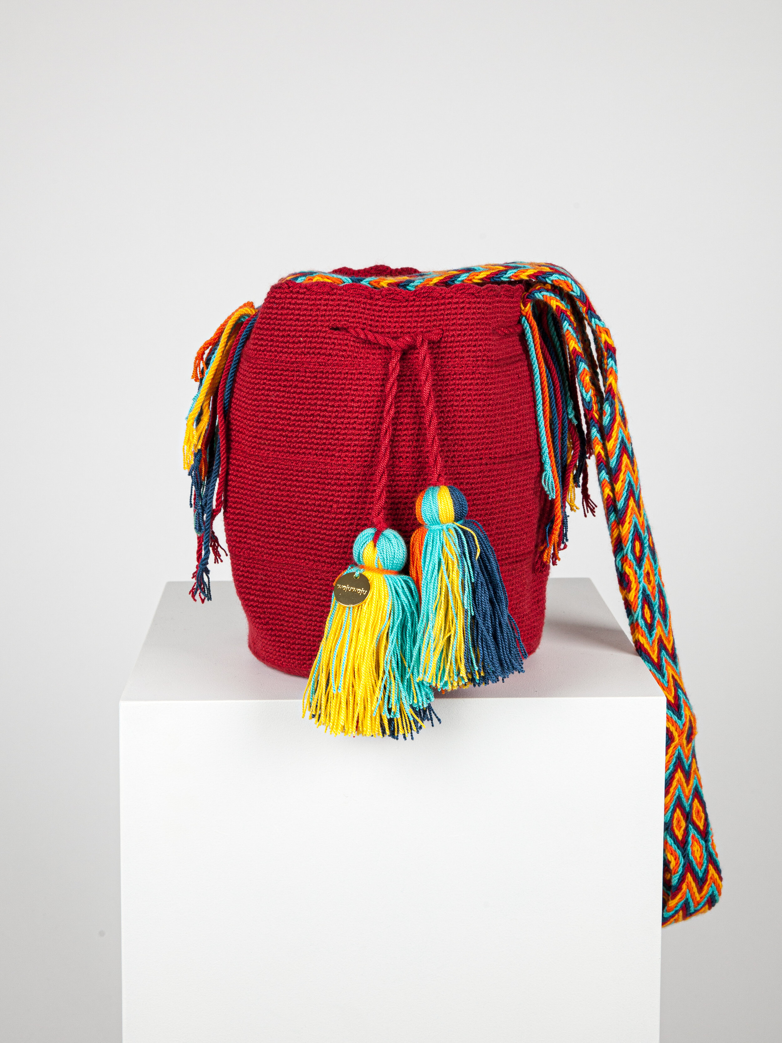 MEDIUM WAYUU UNI-COLOUR BAG - DARK RED / BLUE TASSLE