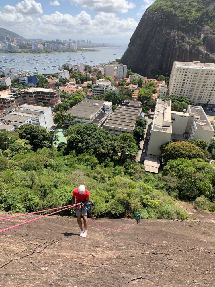 Student rappelling during his rock climbing lesson