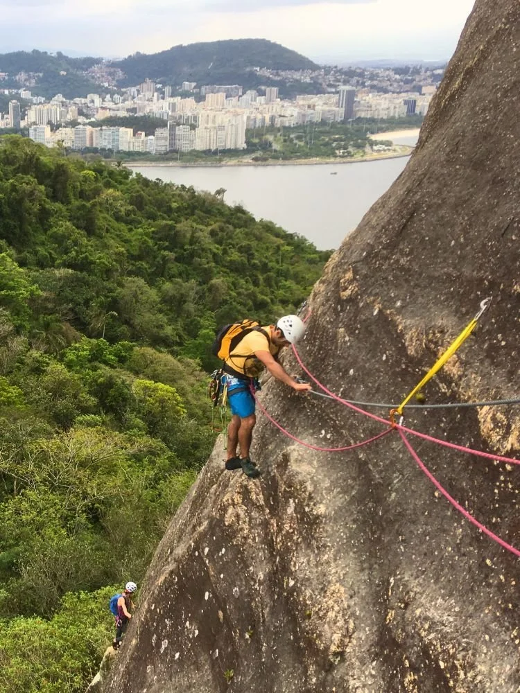 Climber on the first pitch of the Sugarloaf via ferrata CEPI