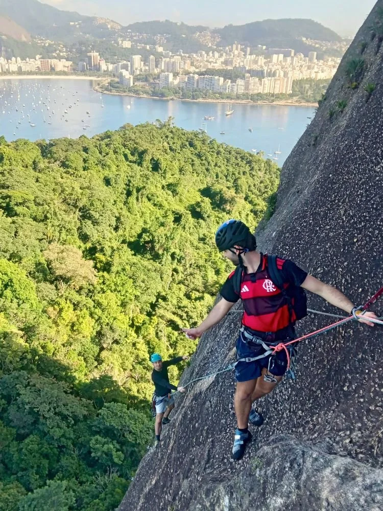Climber on the first pitch of the Sugarloaf via ferrata CEPI