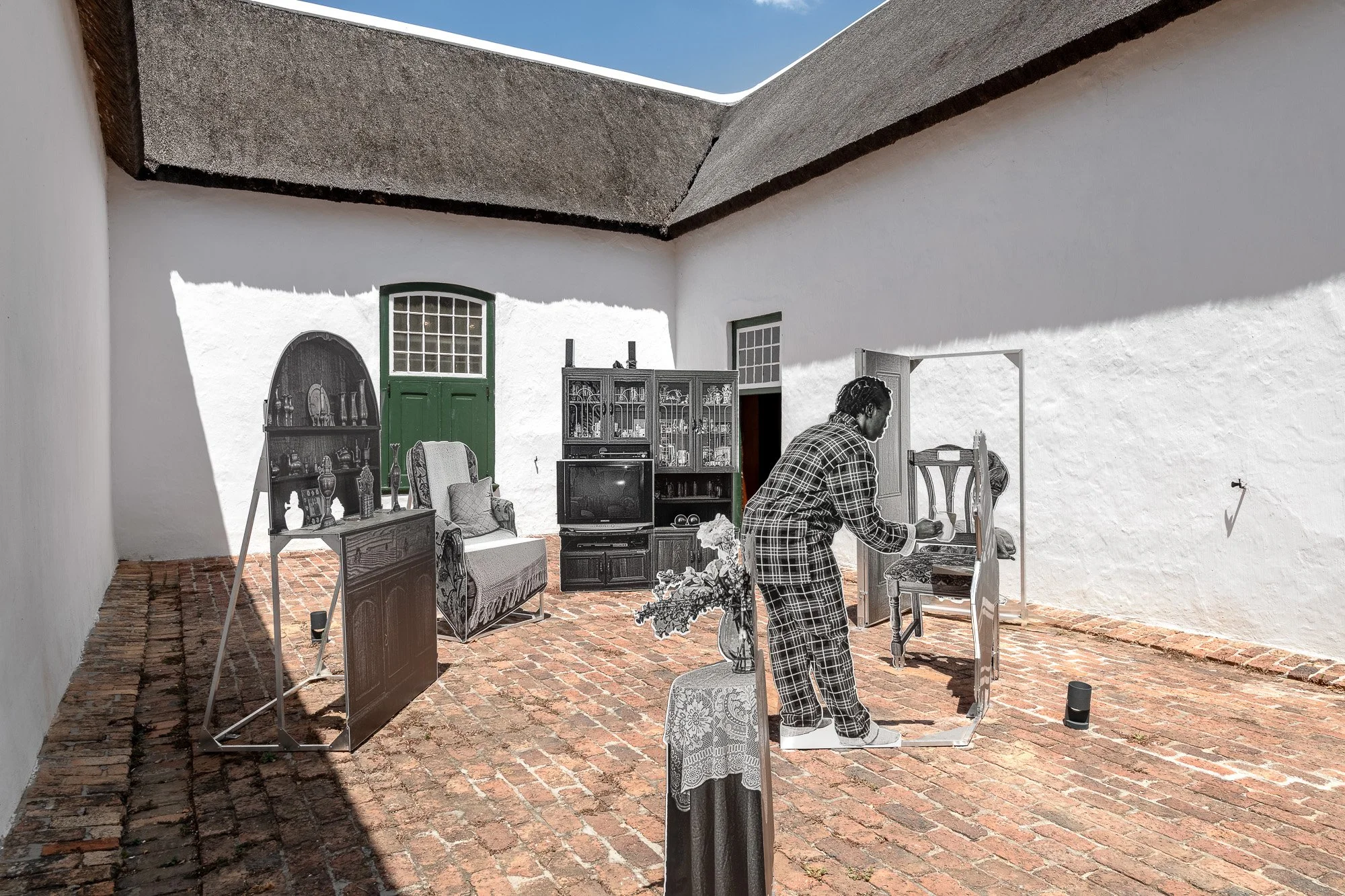   Woman in the middle of the night,  2024 Photo-sculpture installation, UV print on steel 