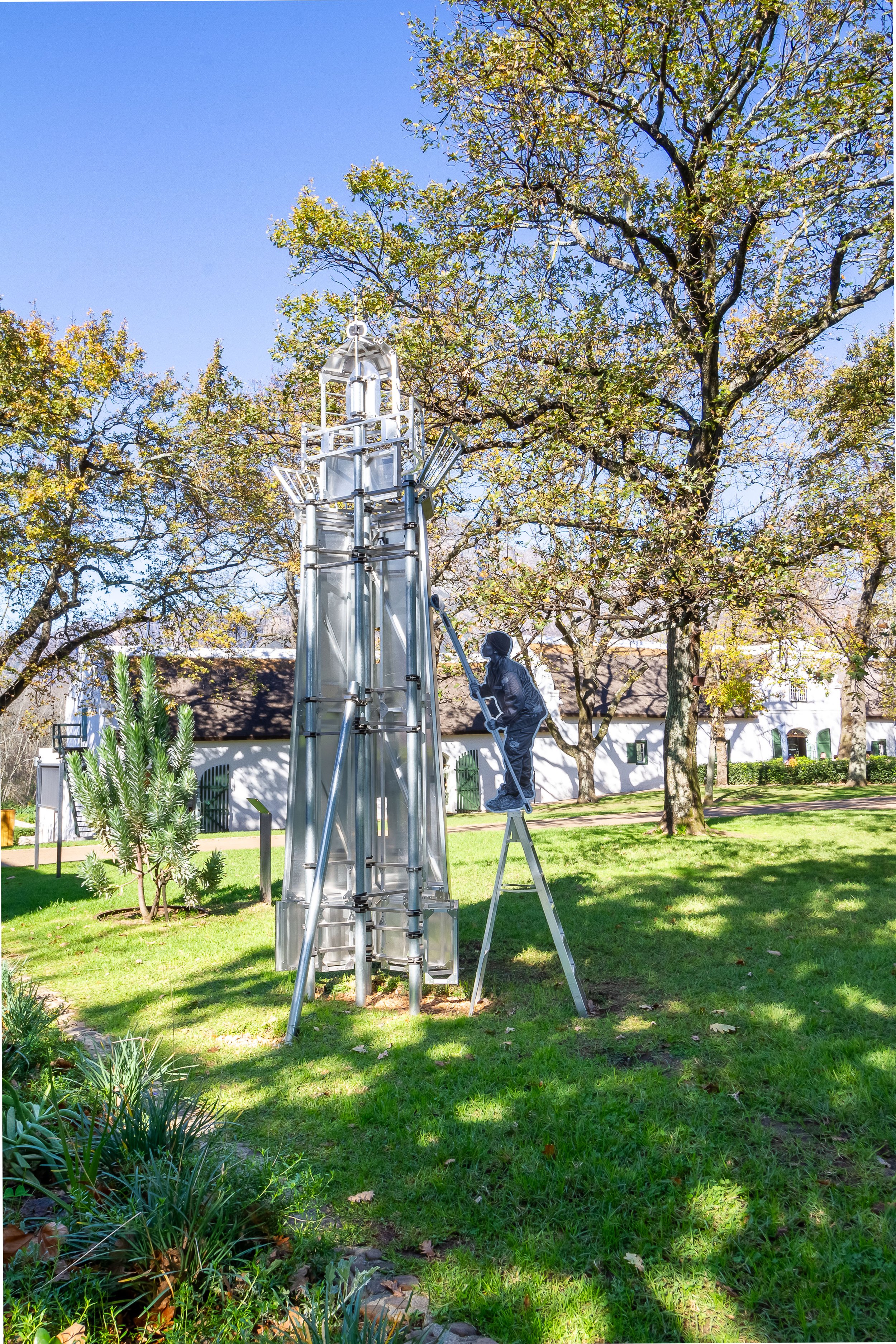   Prisoner doing the general work,  2024 Photo-sculpture installation, UV print on steel 
