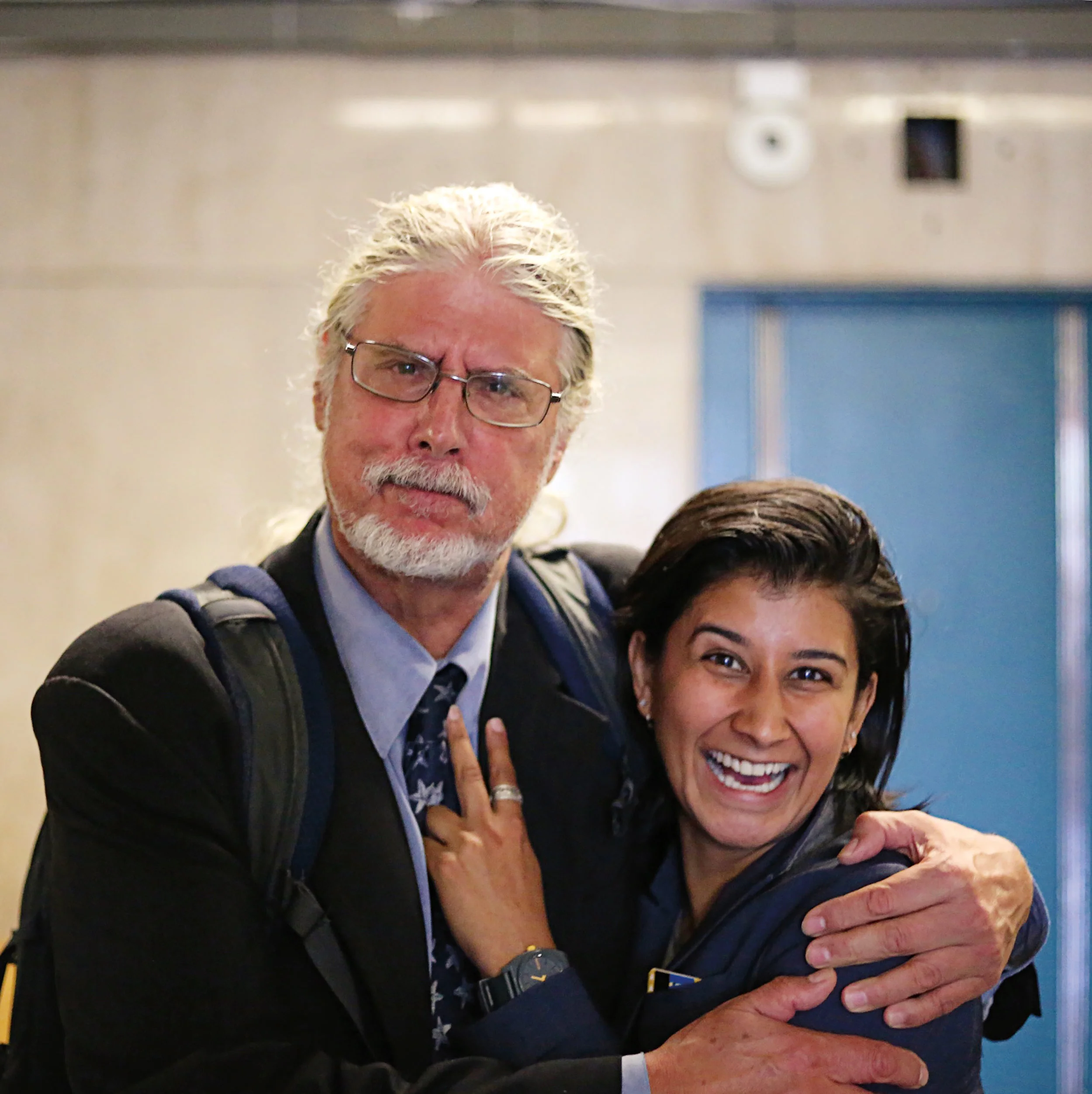 Trivedi (r.) with her law partner and mentor, Ron Kuby.