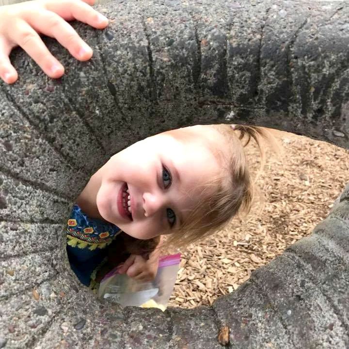 Smile! A happy child playing during a children's ministry summer field trip at First Presbyterian Church, Sioux Falls.