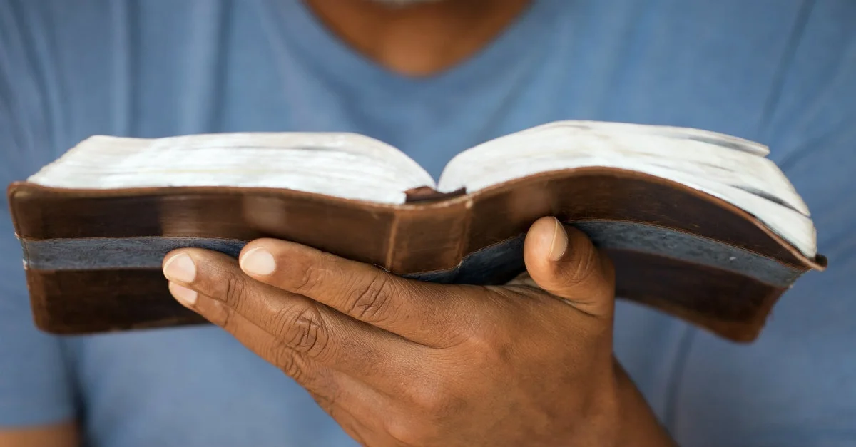 34156-Bible-handholdingBible.1200w.tn.jpg