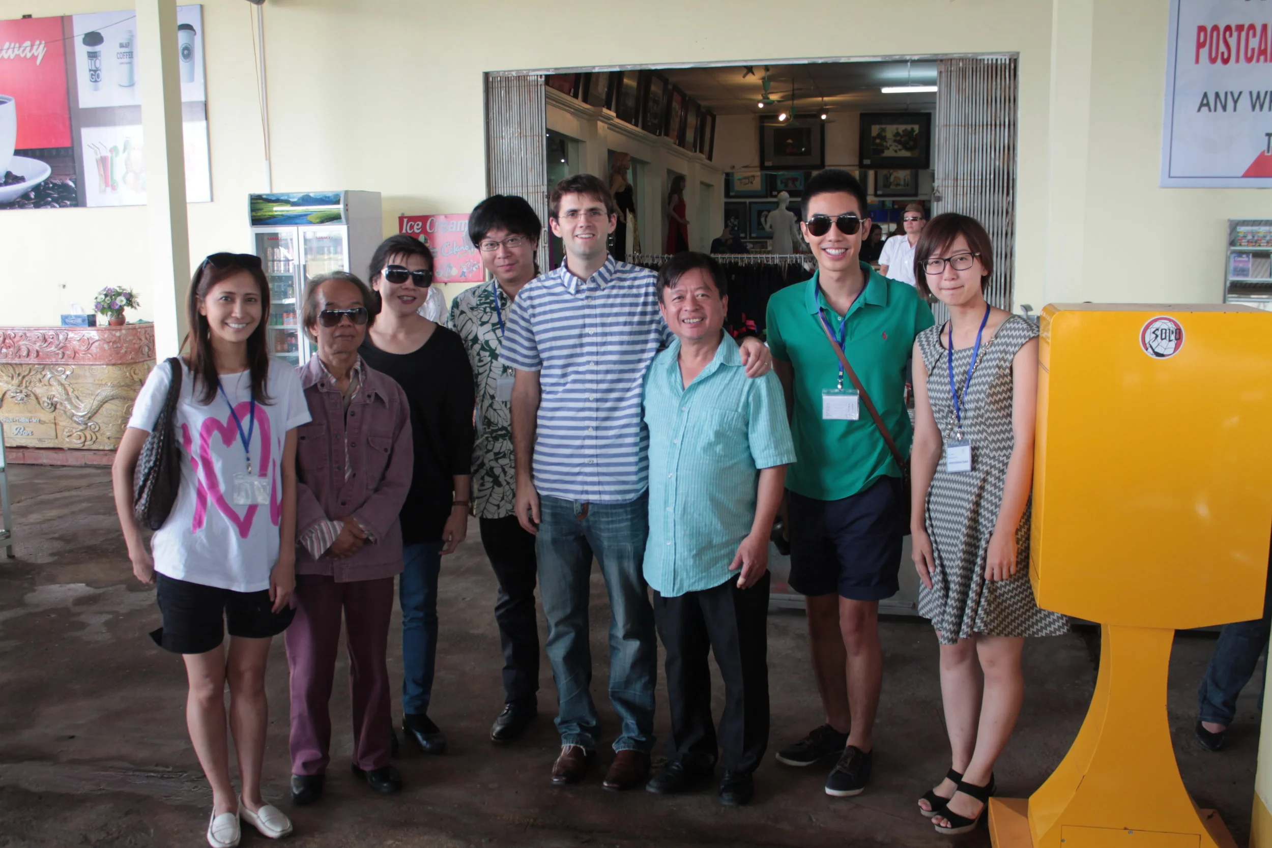 AANMI team members Sayo Kosugi, Kah Chun Wong, Rain Senavinin, and Ayane Sato pose during a roadside pit stop with composer Nguyễn Thiên Đạo and festival organizer and composer Đỗ Hồng Quân.