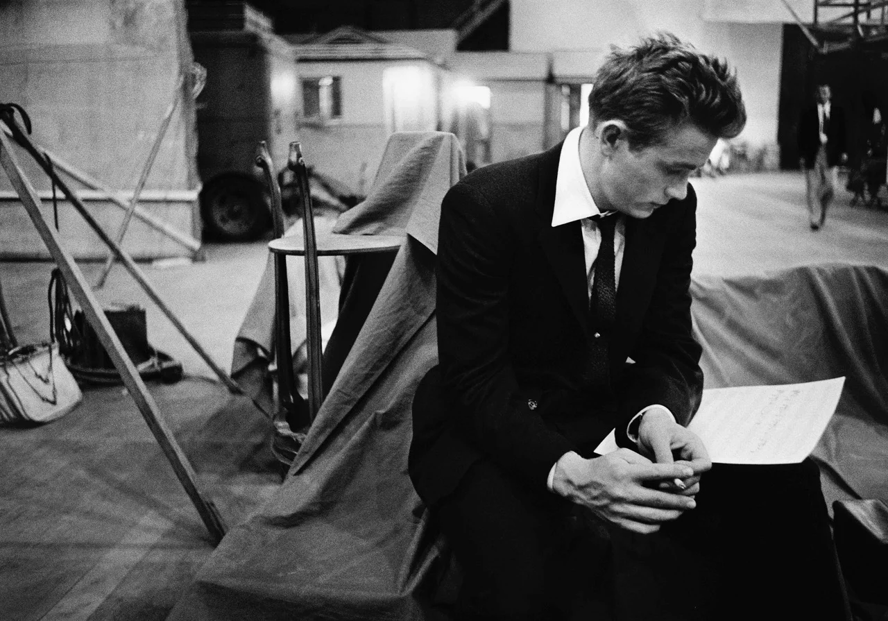 James Dean reading on the set of Rebel Without A Cause, 1955