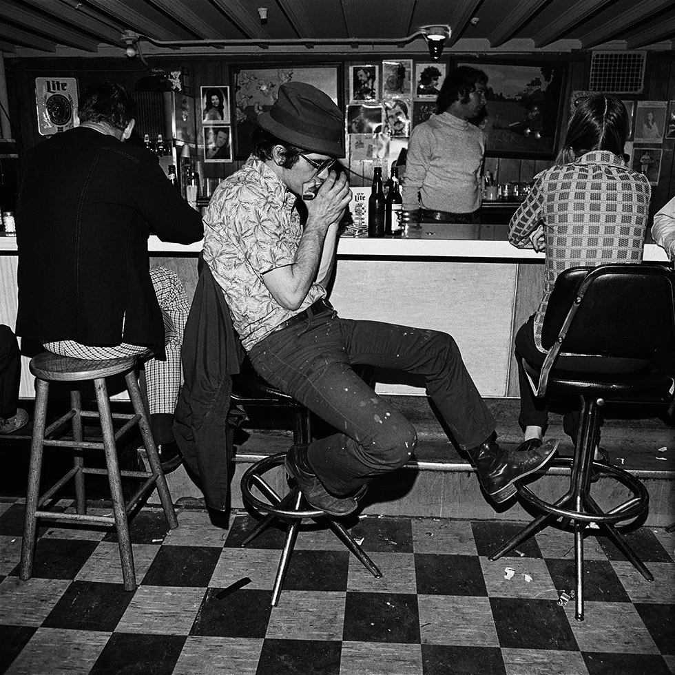 Harmonica Player, Nashville, 1974 by Henry Horenstein
