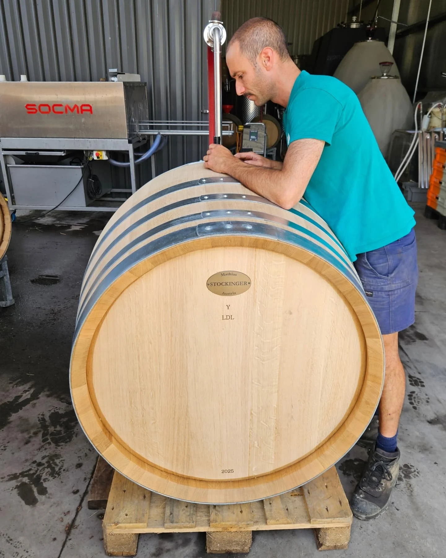 Larderdark x Stockinger. 
This is brother Remi. Brother Remi is filling a new, 600L, thick-staved Stockinger cask with our beloved Larderdark Chardonnay. Take a look at the following (undoctored) images of the inside of the cask. The tight grain, lon