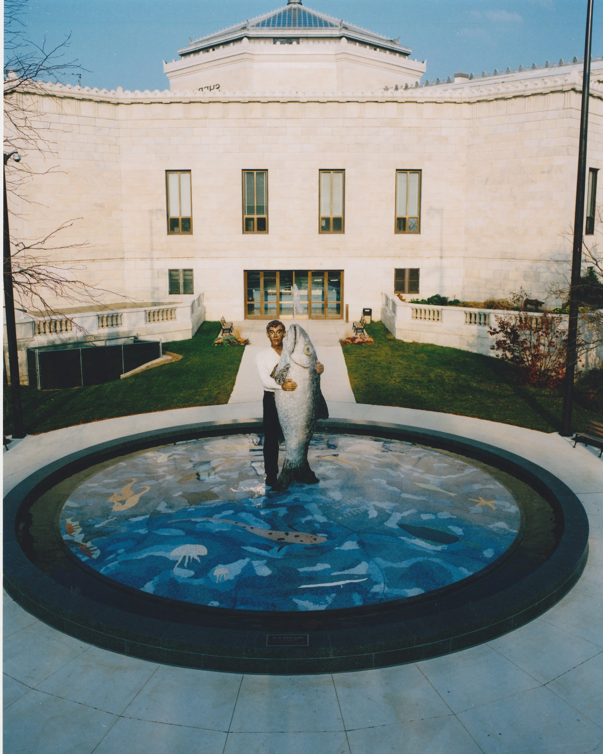 Shedd Man and Fish Standing.jpg