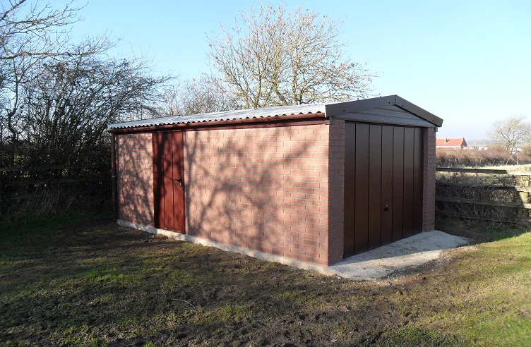 This garage was built with a red brick effect finish. This service does require a 1 metre access around the building, but is available in a selection of colours.