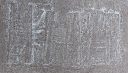 Marks from creased plastic