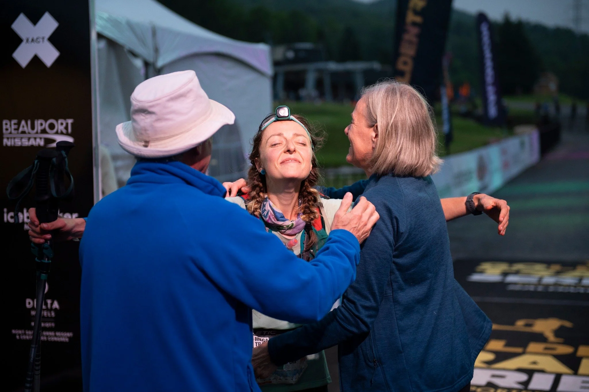 QMT 2024 Finish Line Hugs.jpg