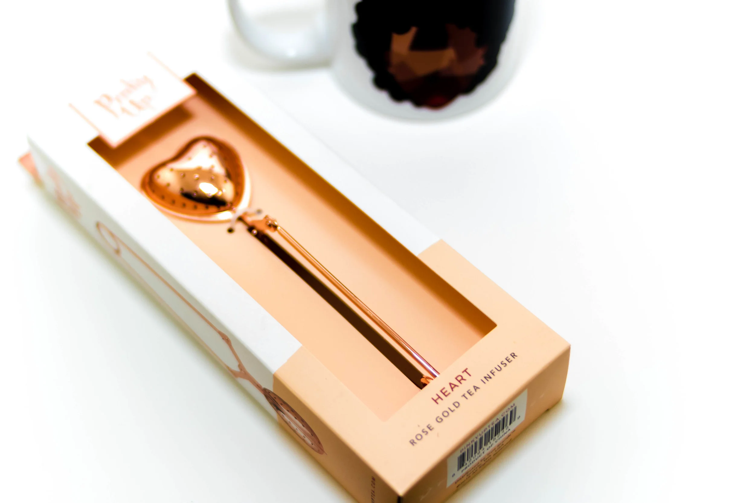 A tea infuser is what you put your loose leaf tea in and then place in a mug or teapot to steep or brew and this Rose Gold Heart Infuser from Pinky Up does you one better and doubles as a stir stick. Do you sip with your pinky up?