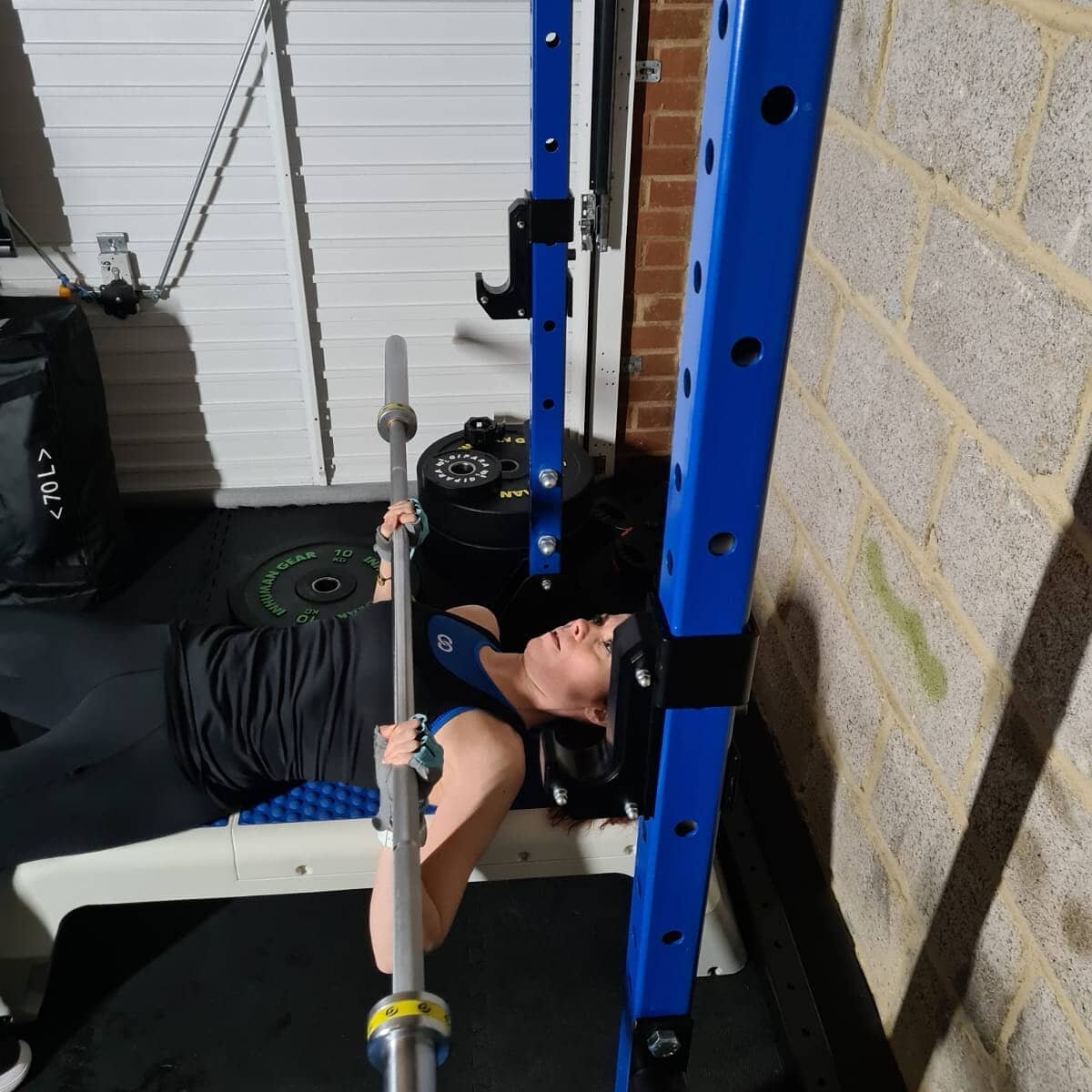 Getting used to chest pressing with an Olympic bar again. I do what I preach...taking it slowly after 10 months break..here warm up with bar only.
It is possible to do this without the rack but so much nicer with it. Did you notice the custom C.B. Fi