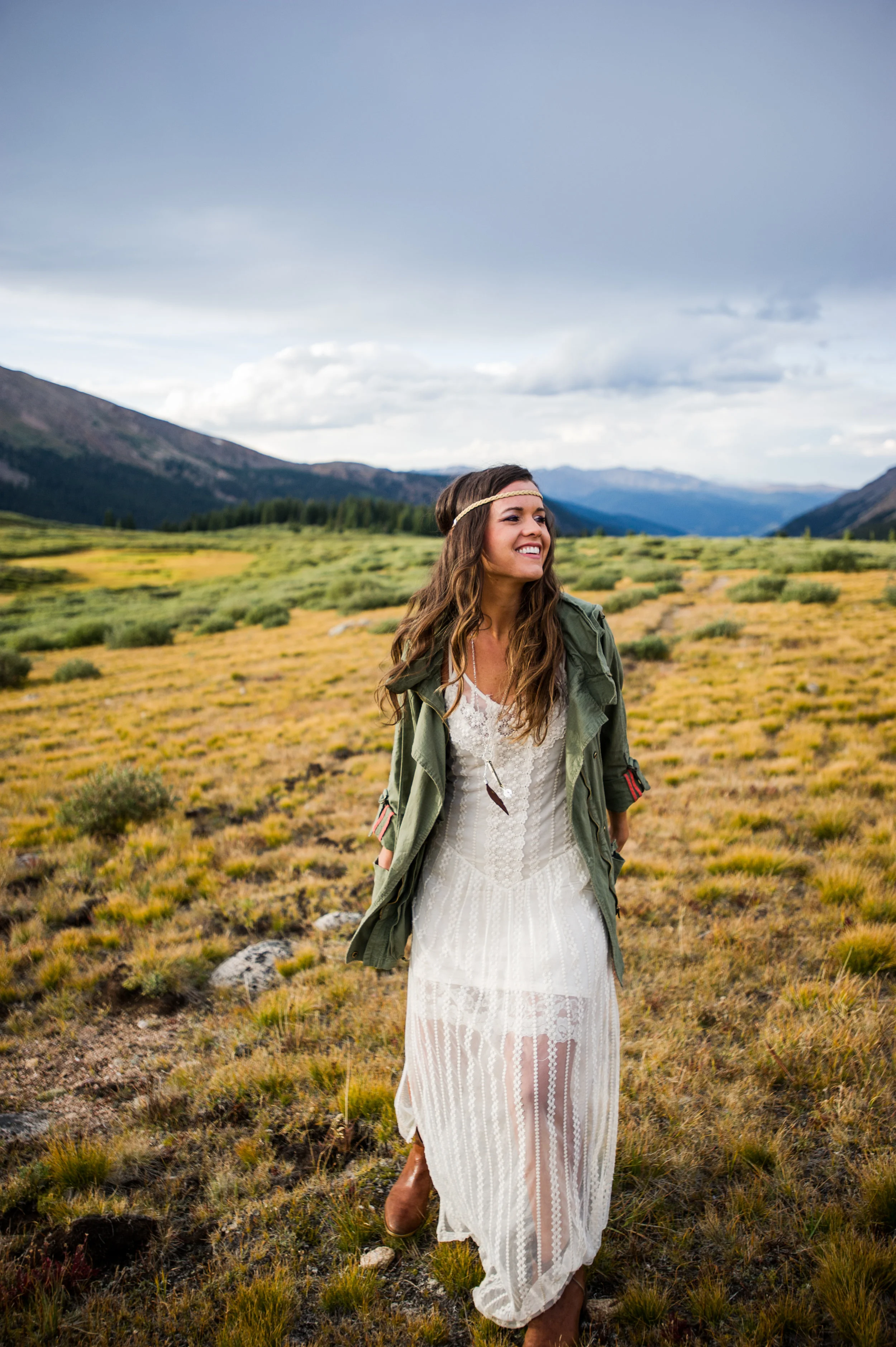 Girl in White Dress Walking In a Field