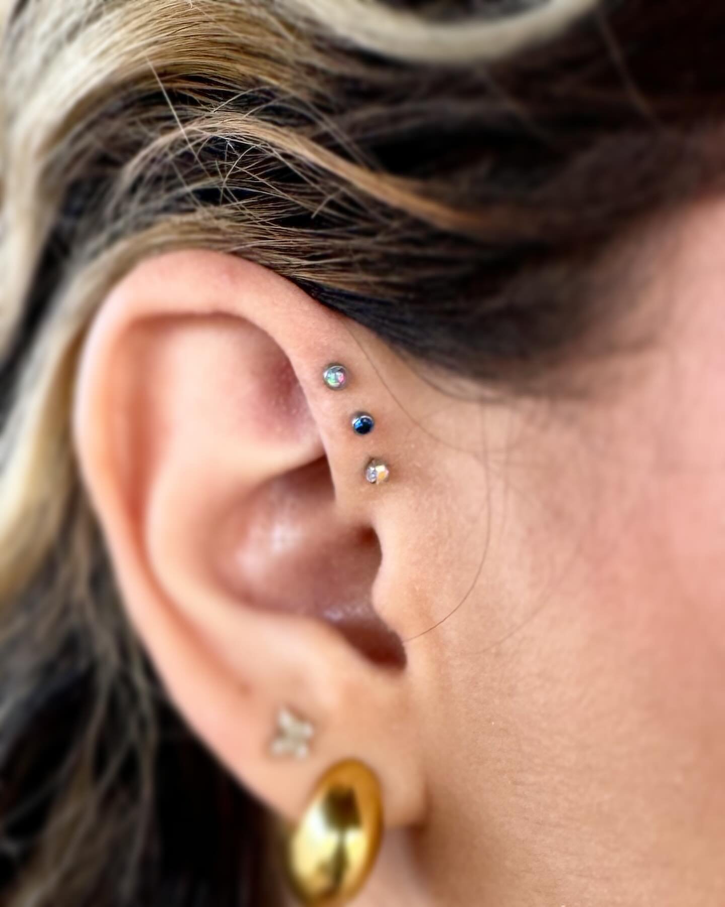 Healed triple Ford helix by Jose Tallon - @finegoldbodyjewelry here at @adornmentbodyart with @neometaljewelry titanium jewelry.

Jose pierces Monday through Thursday from 12 to 6 last Piercing is taken at 5:30 .
To book an appointment call 760-565-2