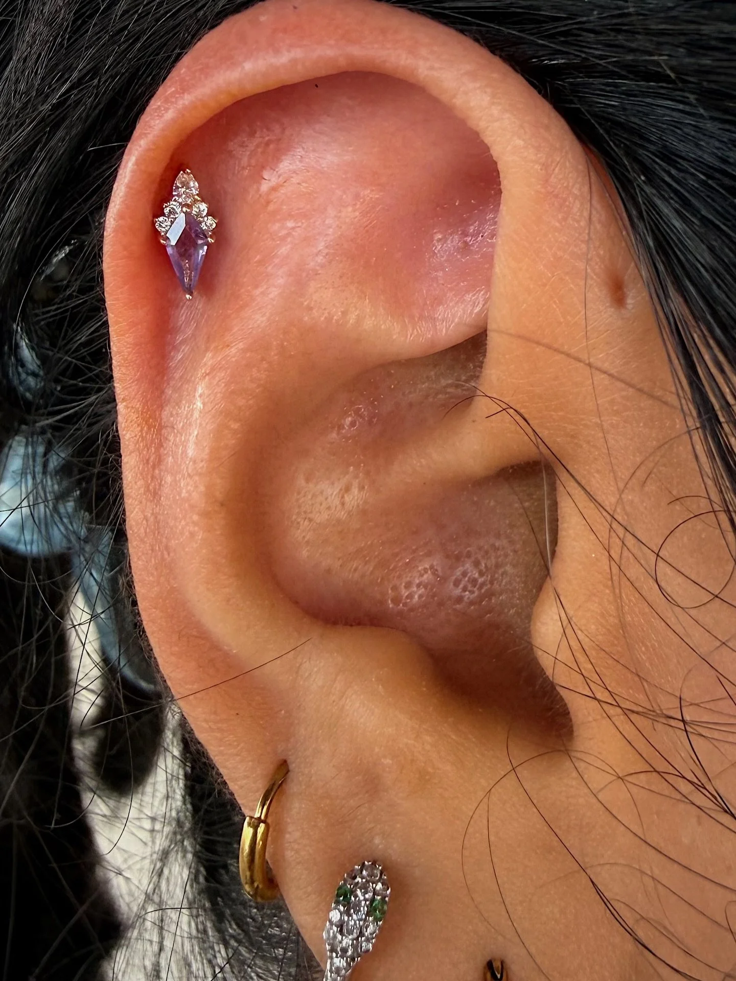 Perfect placement of this Amethyst &lsquo;Afterglow&rsquo; from @buddhajewelryofficial Helix piercing done ✨by Savannah✨