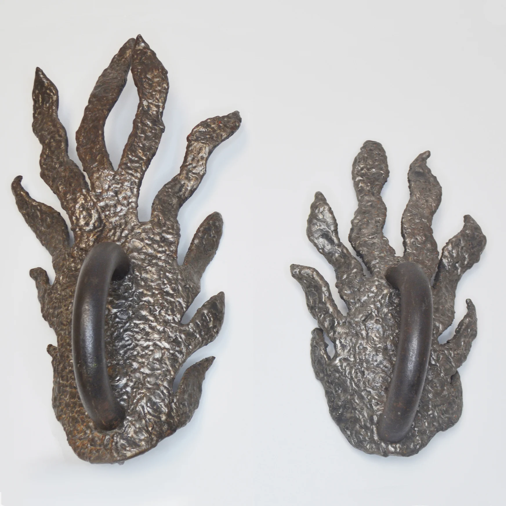 PAIR OF SCULPTURAL BRONZE DOOR PULLS 