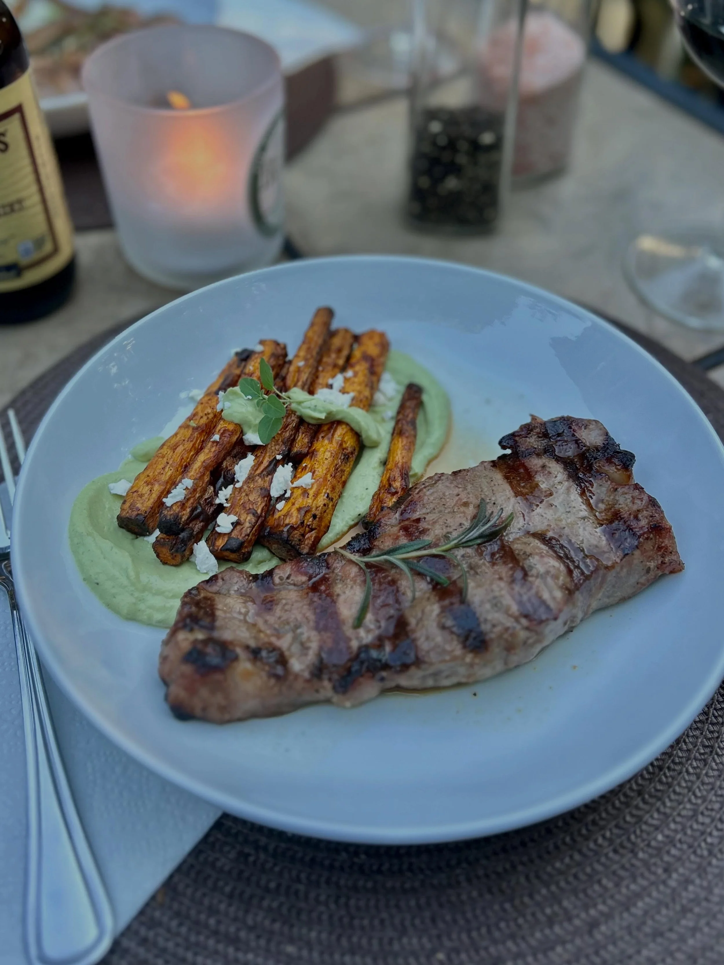 Marinated black pepper truffle rubbed grilled ribeyes, charred carrots with yogurt, avocado and fresh herbs Green Goddess  sauce with crumbled feta. Tastes like summer!  I love cooking with herbs from my &ldquo;garden&rdquo; , the Greek oregano is so