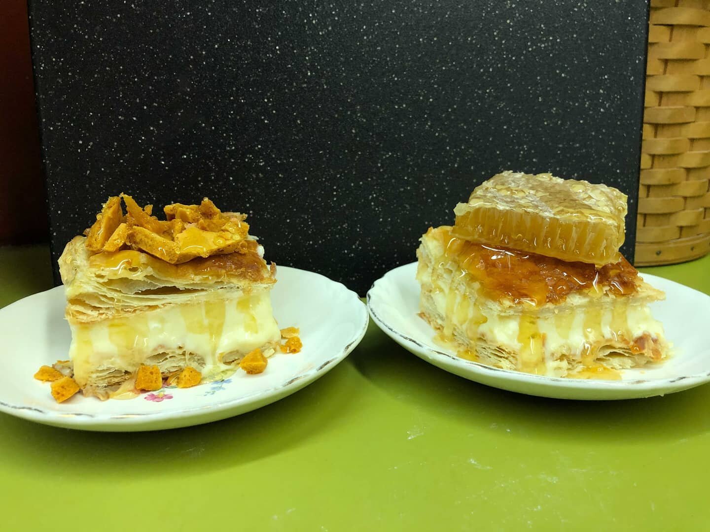 Our final contender: This is a Honey Vanilla Slice with honeycomb. On the left is the original recipe and on the right is my take on it with a little natural capped honeycomb. This is a puff pastry with a honey and vanilla flavored custard in the mid