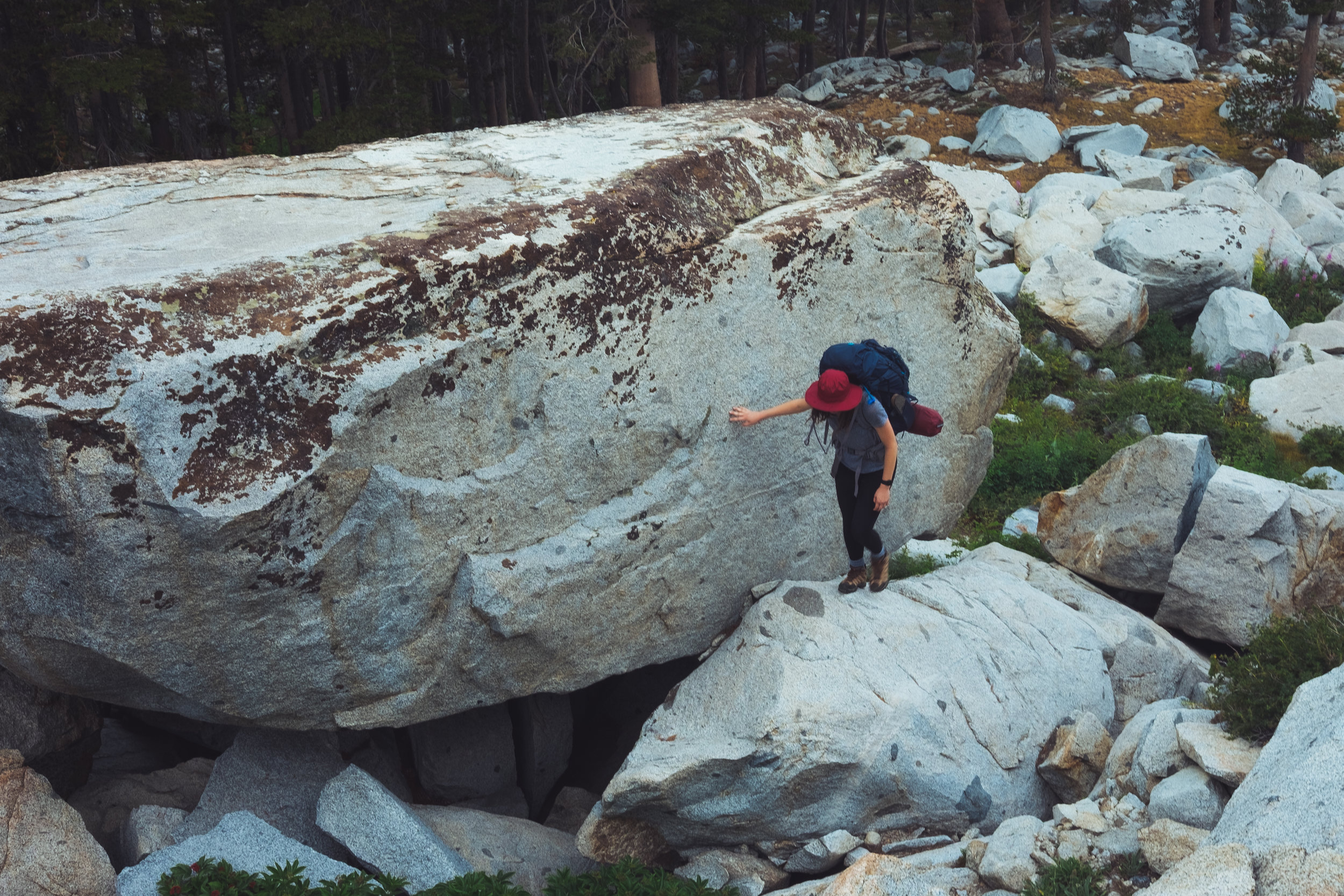  emily scrambling on some boulders 