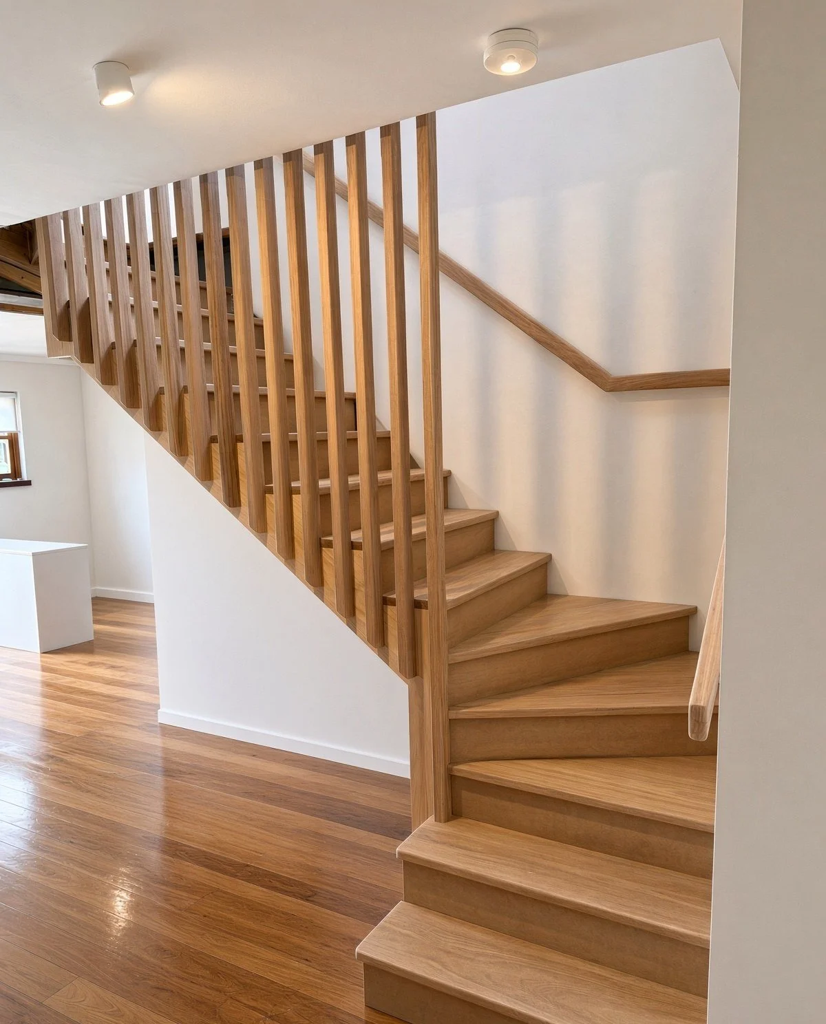  Oak winder staircase with full-height timber batten balustrade and wall handrail, Sydney 