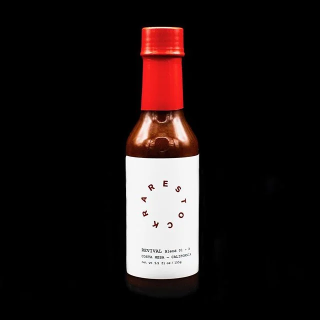 Rare Stock - Revival: Helps you stay warm when it&rsquo;s raining outside.
_
Photo: @megcrade.photo 
_
#rarestock #rarestockgoods #hotsauce #revival #warm #hot #spicy #food #foodphotography #local #loyal #rainyseason #costamesa #california #usa