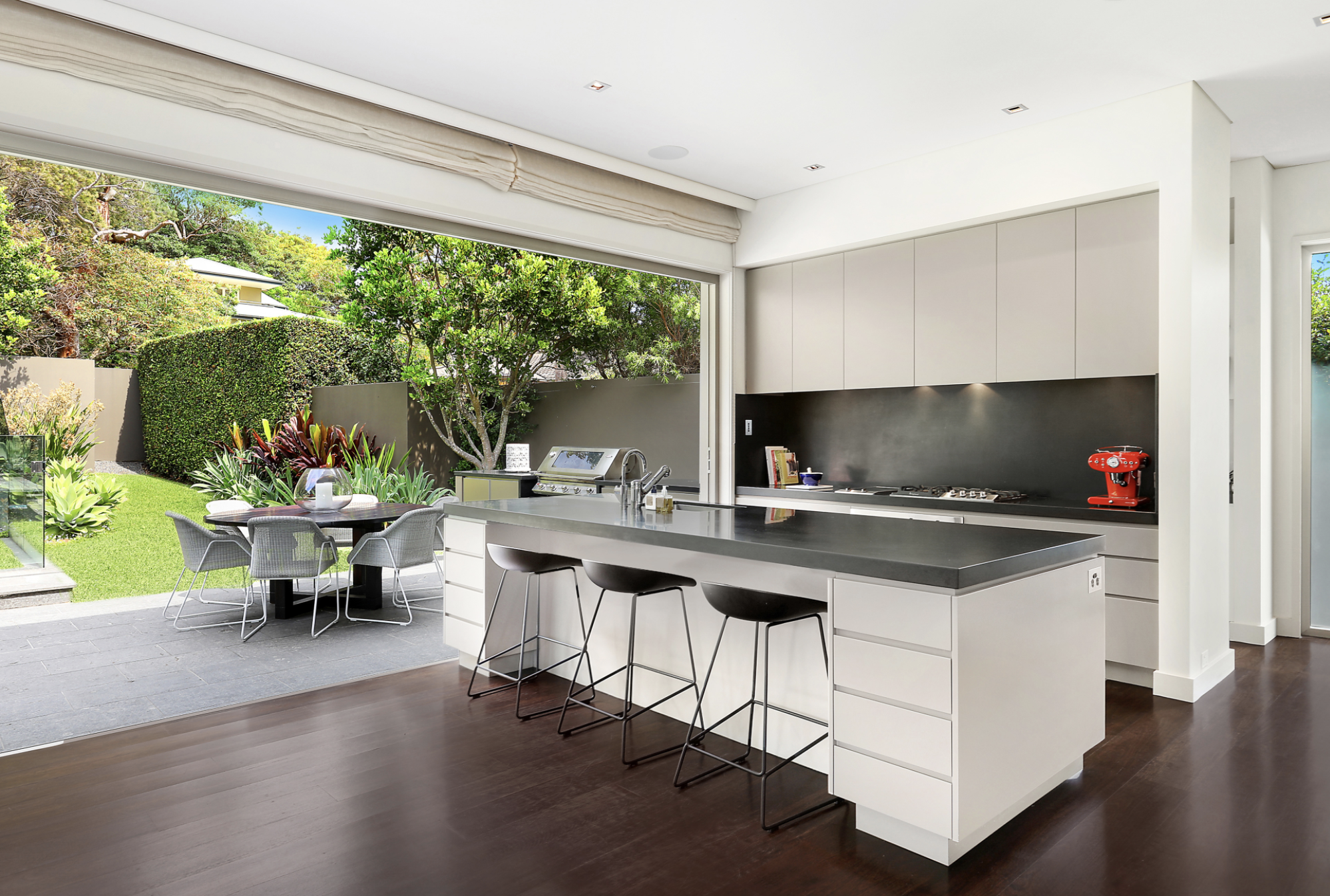 A stunning kitchen and entertaining area is a feature of 9 Plunkett Rd, Mosman.