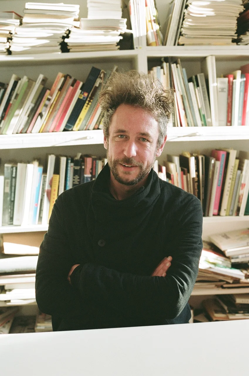 Rumpfhuber, in his office.