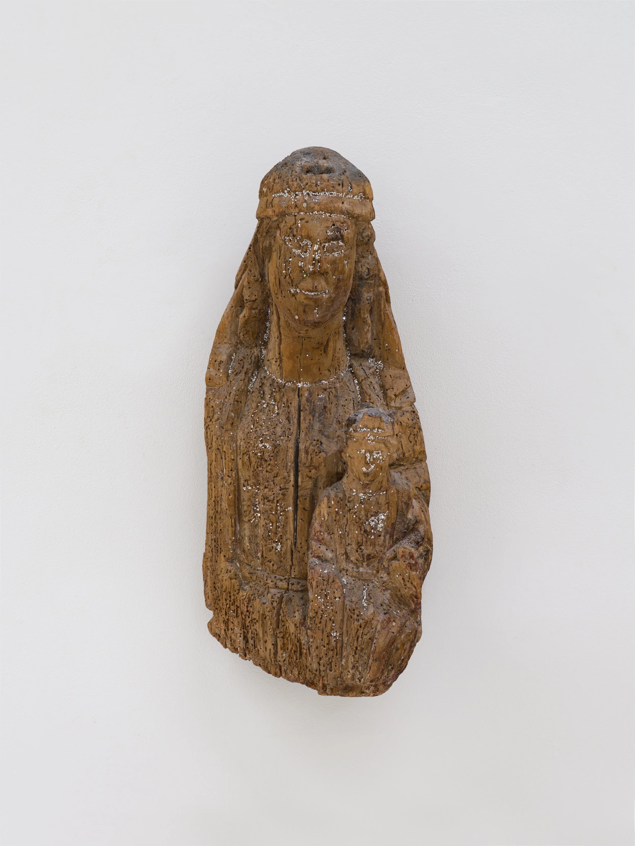  Kris Martin  Madonna , 2025 Roman (ca. 1200) Madonna with child from weathered wood with natural diamonds 50 x 23 x 17 cm 