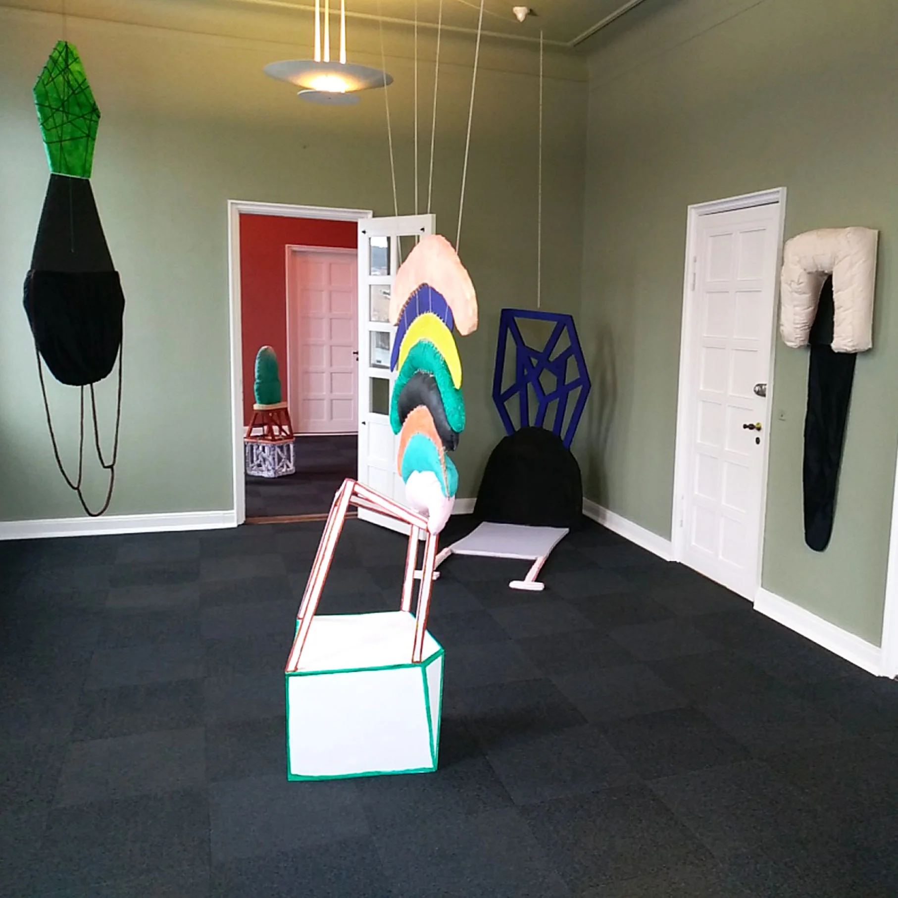 Marie J.Engelsvold. "I don't mind the gap" From the left: ”Surrendering.” Texstile, yarn, wood ,foam, mural cord. 256 x 84 x 2 cm. 2016 ”Holding on to happiness” Wood, stuffed textile objects, acrylic paint, foam, yarn. 190 x 97 x 67 cm. 2013 ”Creature.” Wood, foam, textiles, stuffed textile objects, acrylic paint, yarn. 303 x 83 x 8 cm. 2013 ”I can’t hide this feeling anymore” Stuffed canvas on canvas, yarn, textiles, acrylic paint. 110 x 56 x 53 cm. 2014