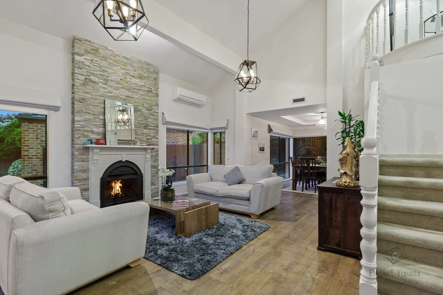  Catalpa House - Interior shoot showcasing a stunning fireplace  and high ceilings in this cosy living room. Luxury real estate and architecture.    