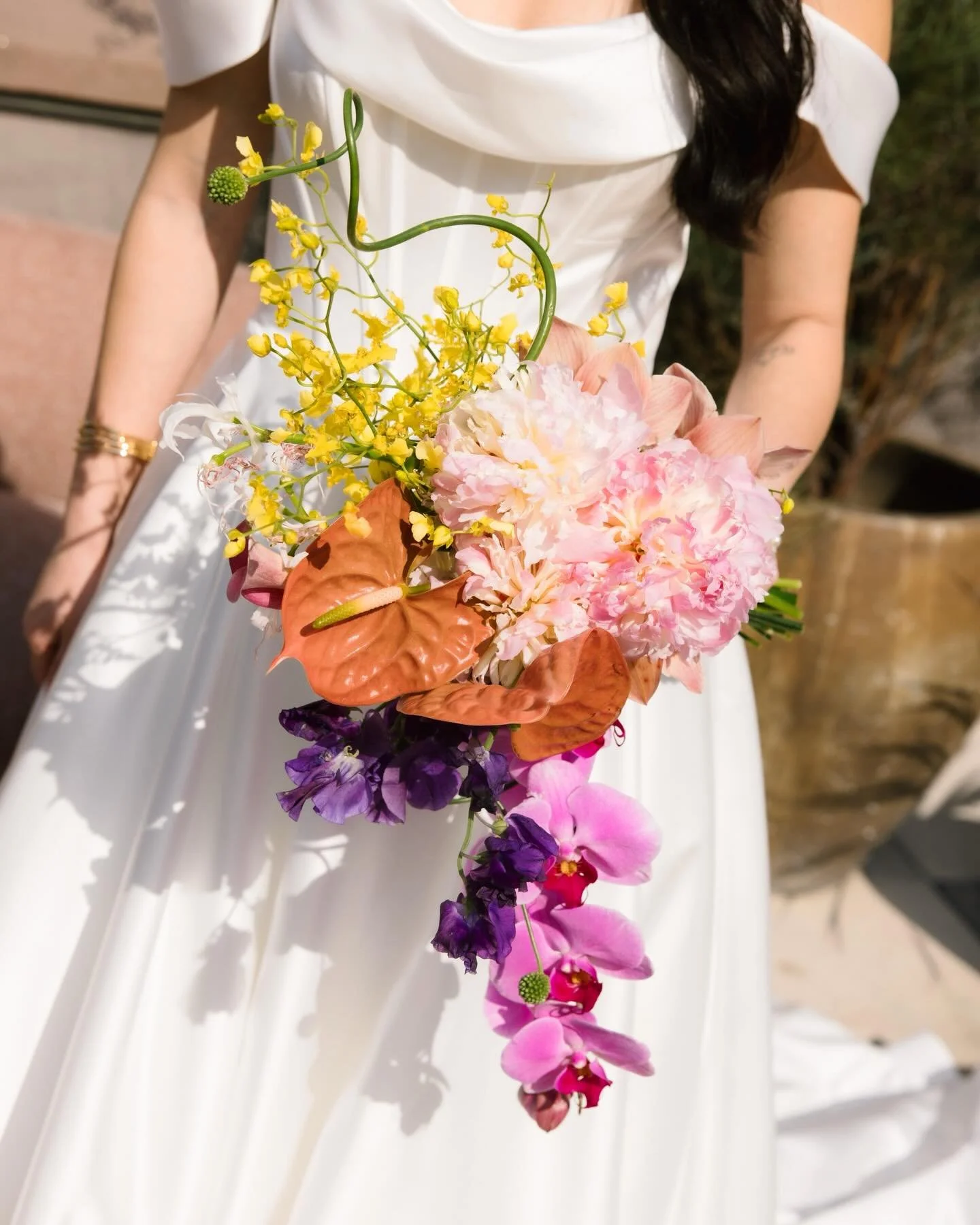 Photos from Lean and Alina&rsquo;s wedding last month, surrounded by their vibrant community (and florals).

The second photo is one of my favorites from the entire day. I snuck into the wedding suite to snap a quick photo of Alina after she put her 