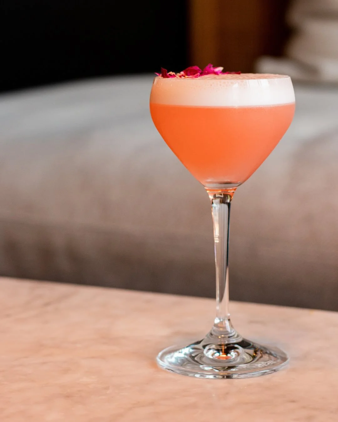 Today&rsquo;s cocktail feature &mdash; GINS N&rsquo; ROSES 🌹 

Gins n&rsquo; Roses combines gin, Aperol, rhubarb liqueur, lemon, egg white, and a rosewater spray. Lightly bitter, citrus-forward, and delicately floral&mdash;balanced with a soft, silk