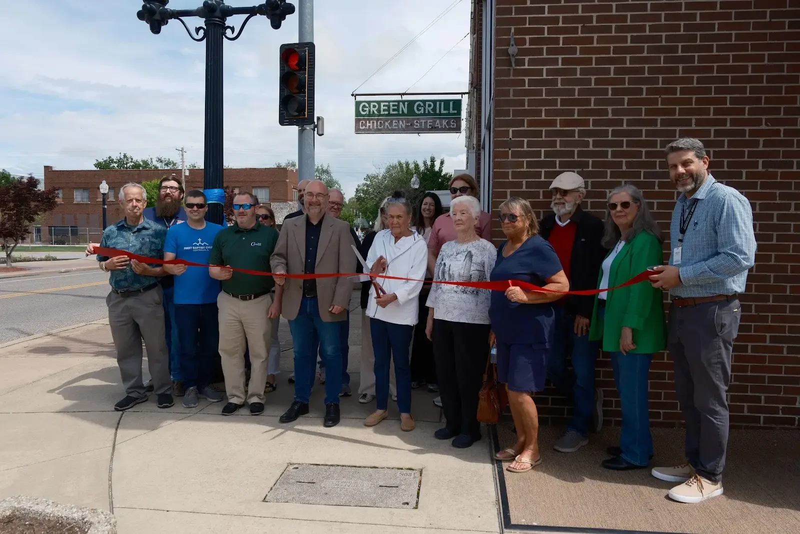 Chamber Dedicates Commercial Historic District Project to John Stuehmeier at Ribbon Cutting, Gives First Walking Tour of District
