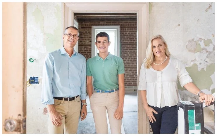 Homeowners Scott and Kathleen Edwards, with their 15-year-old son / Photo by Kate Thornton