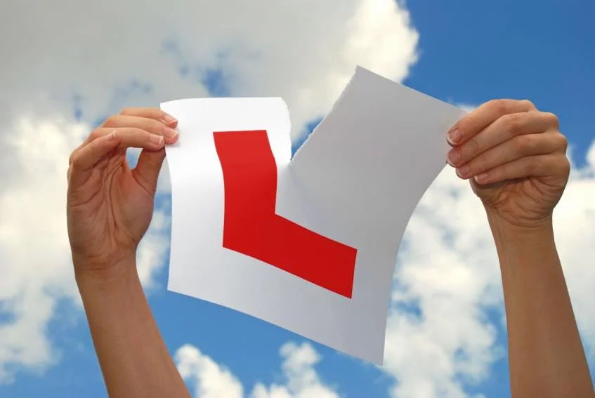ripped learner plate .jpg