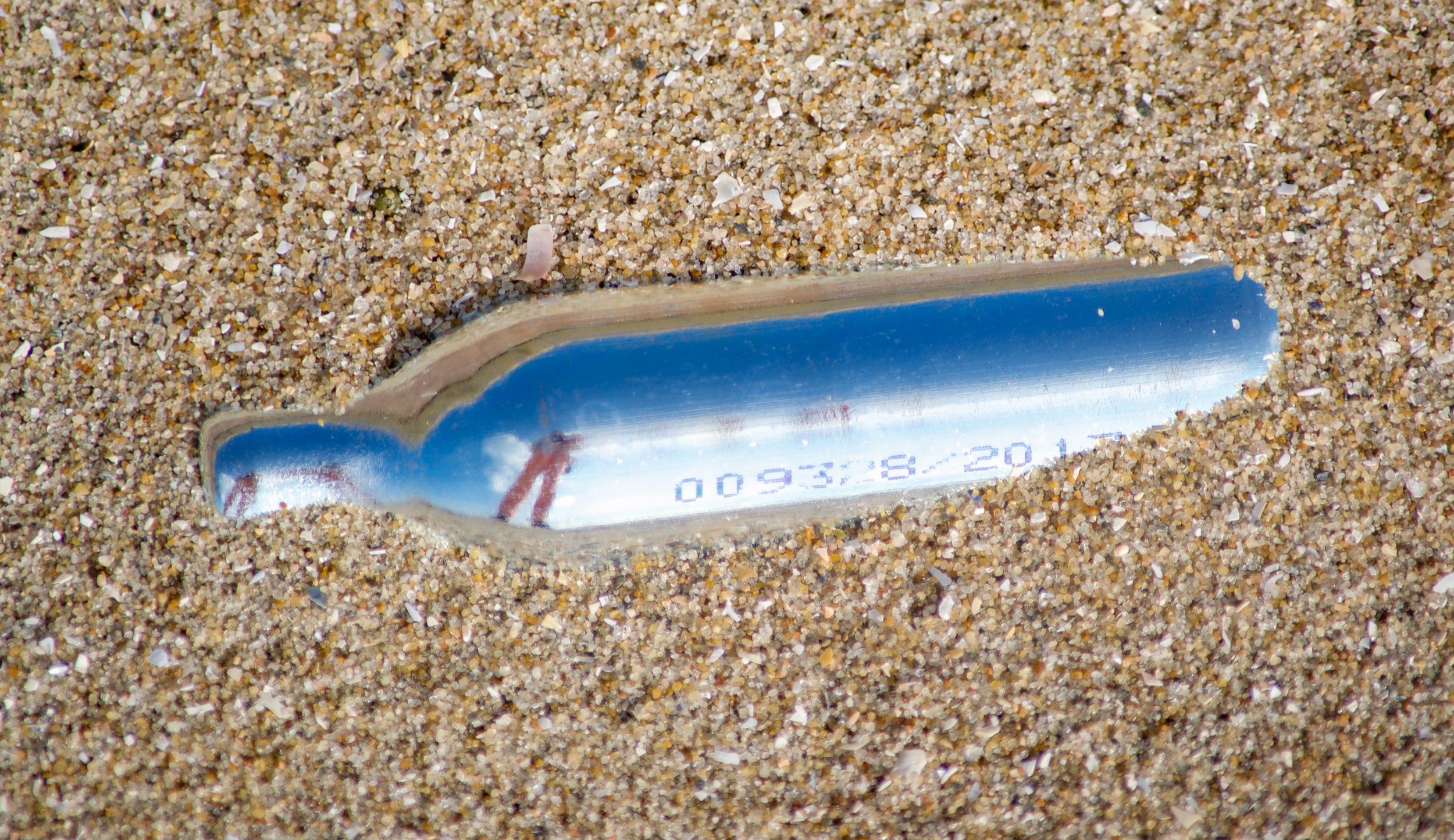 Phial in sand