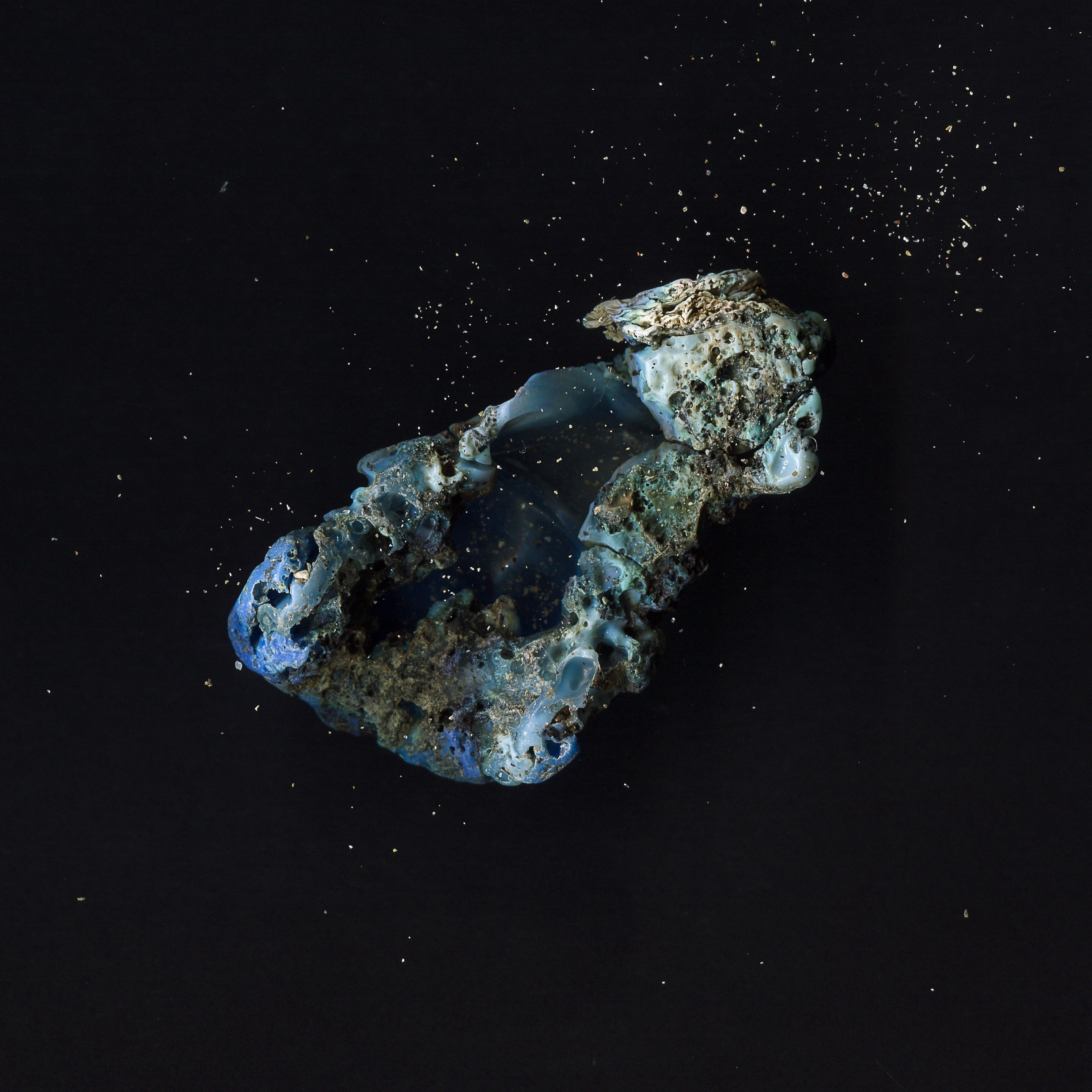 Dark Matter- blue plastic bottle top 1.jpg