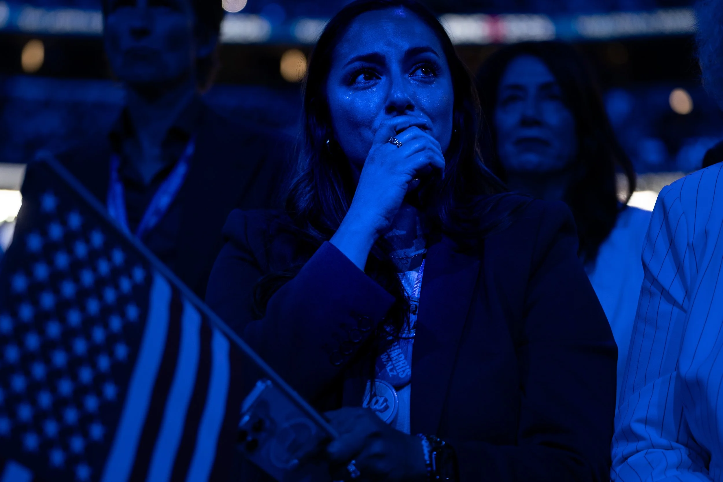  An attendee reacts as she listens to speeches on Day Four of the 2024 Democratic National Convention held at the United Center in Chicago, Illinois on August 22, 2024 