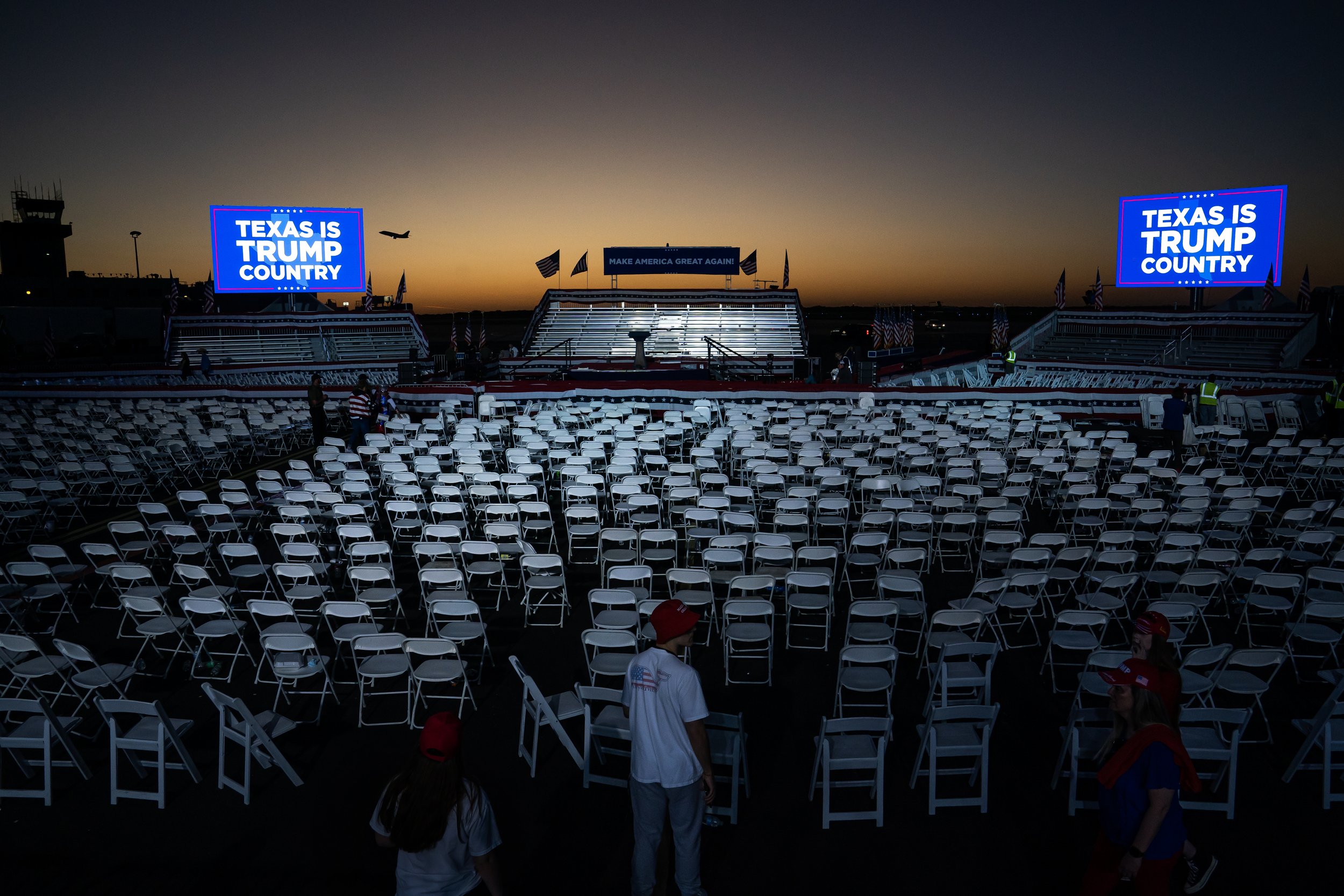  Supporters of former President Donald Trump remain after at a campaign rally at Waco Regional Airport Saturday, March 25, 2023, in Waco, Texas. 