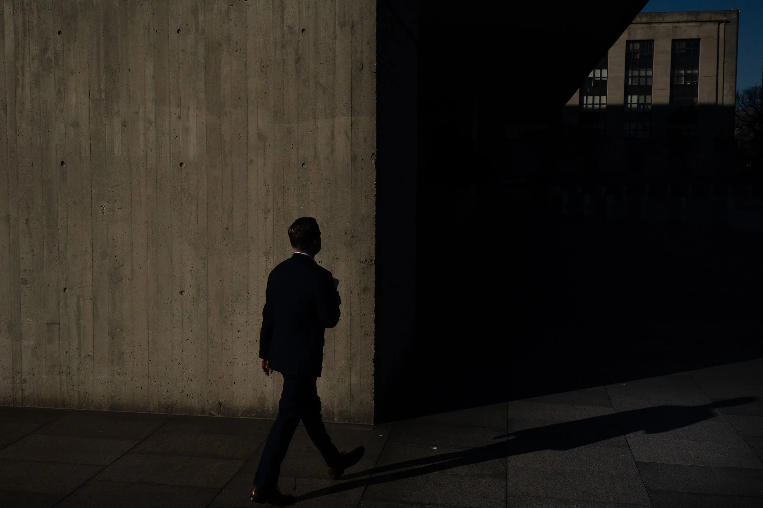  A federal employee arrives for work at the Department of Health and Human Services following the longest U.S. government shutdown in history, in Washington, D.C., U.S., November 13, 2025. 