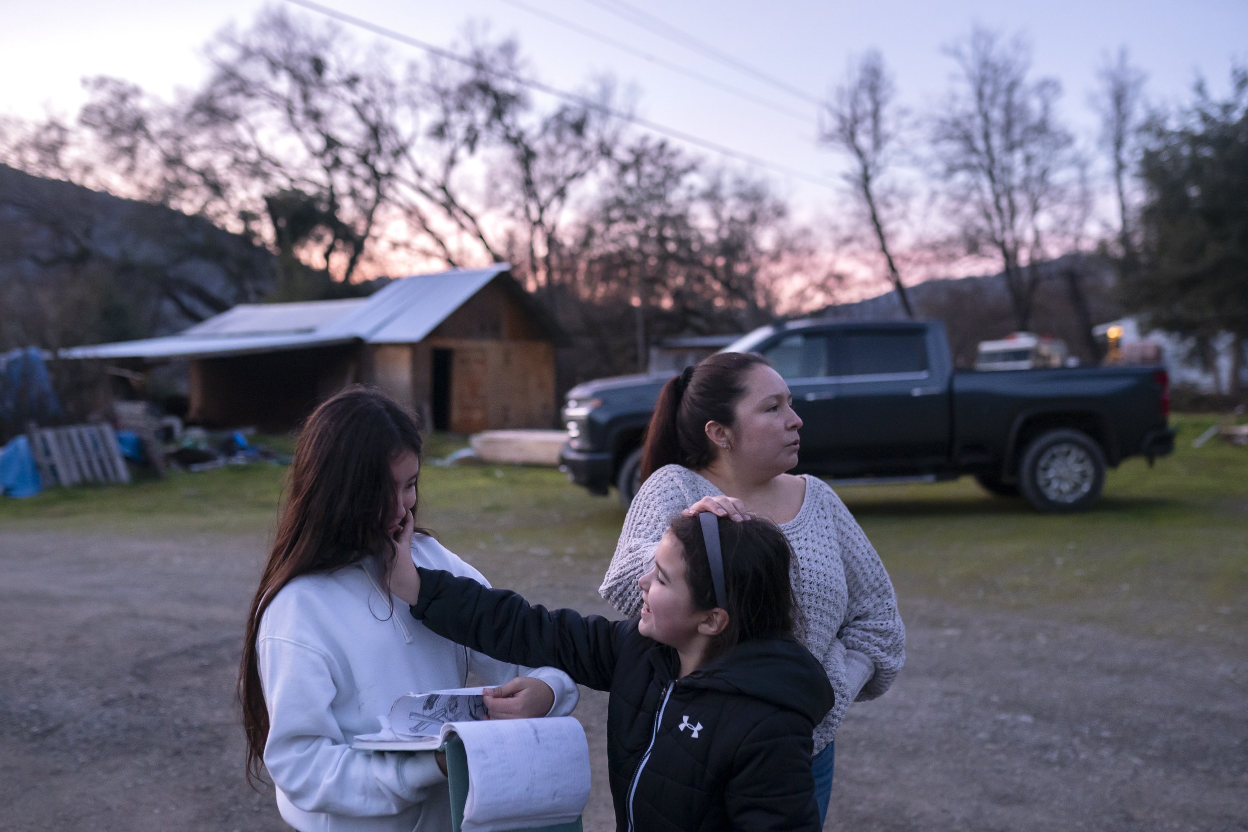  Brandice Davis talks about Emmilee’s case while walking with her daughters Maile Kane, 13, and Gracie Kane, 9, near their home on the Hoopa reservations on Thursday, January 20, 2022, in Hoopa Valley, California.  