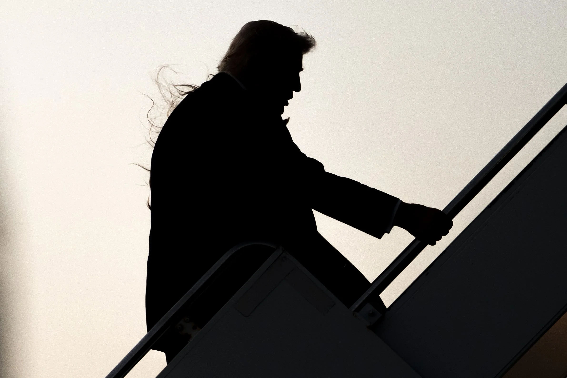  U.S. President Donald Trump boards Air Force One at Palm Beach International Airport on February 16, 2026 in West Palm Beach, Florida.  